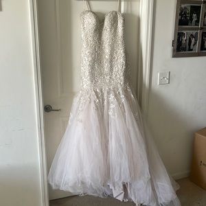 Blush pink Allure bridal gown.